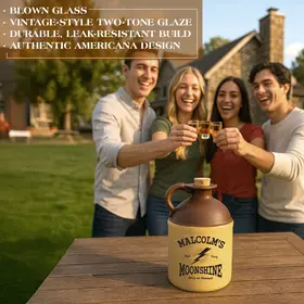 Friends toasting drinks outdoors with a vintage Malcolm’s Moonshine jug on the table, showcasing Americana-style moonshine bottle.