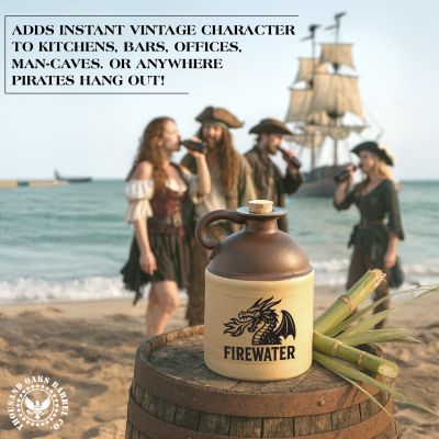 Firewater moonshine jug with dragon logo placed on a wooden barrel at the beach, with pirate-costumed people and a ship in the background, showcasing rustic vintage décor appeal.