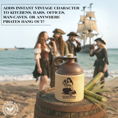Mermaid moonshine jug displayed on a barrel at the beach with people dressed as pirates in the background, highlighting nautical-themed humorous barware.