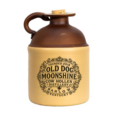 A studio product image of an Old Dog Moonshine ceramic jug featuring a vintage-style black label and cork stopper.